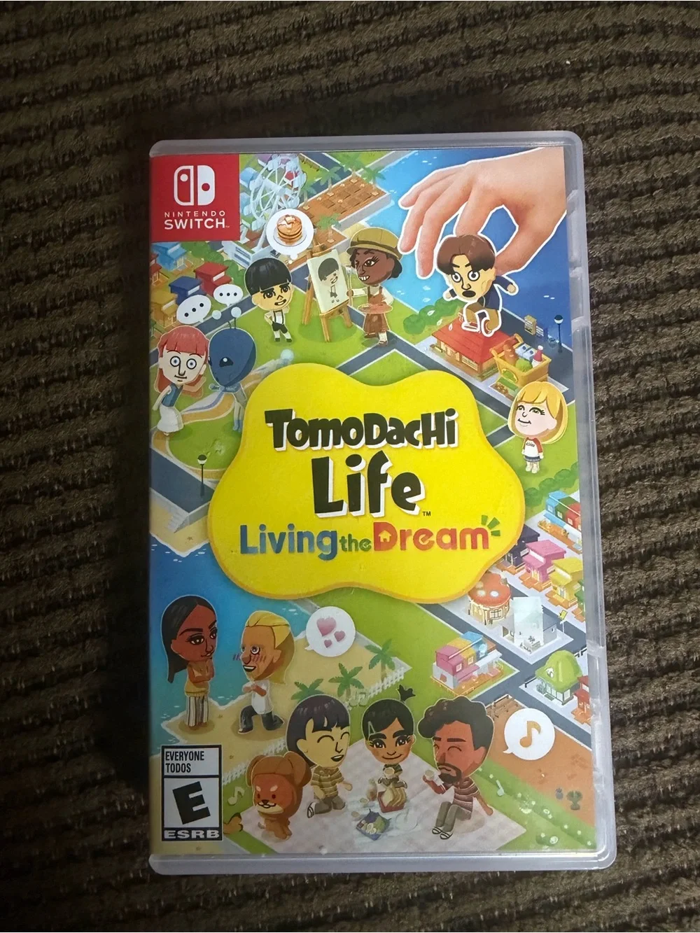 Nintendo Switch Tomodachi Life - Bright Yellow Logo & Colorful Artwork